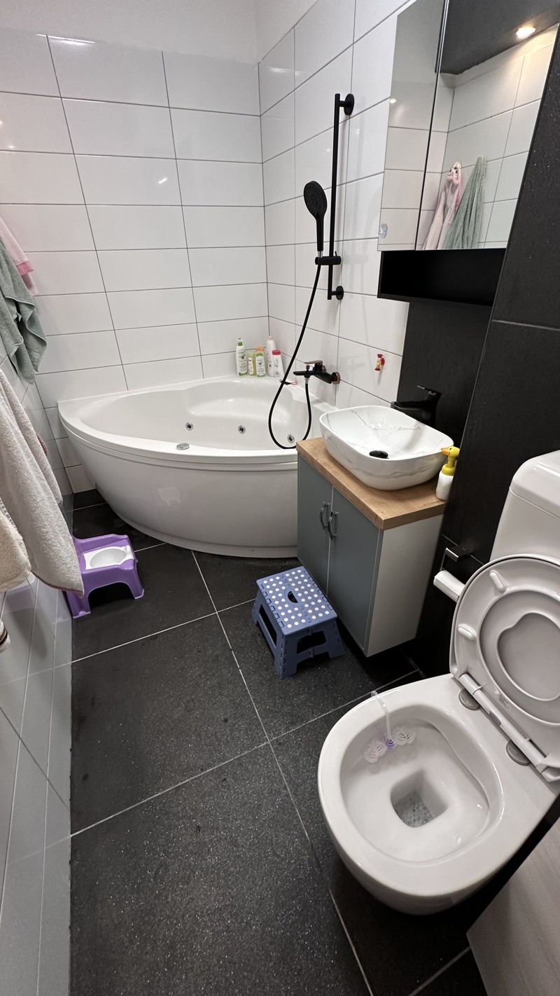 bathroom finished corner bath