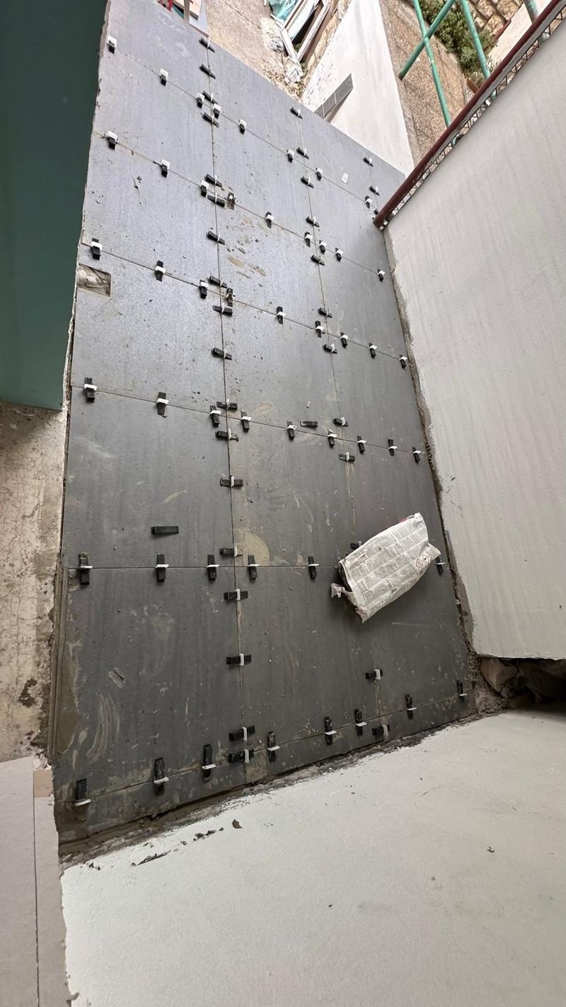 wall tiling in progress